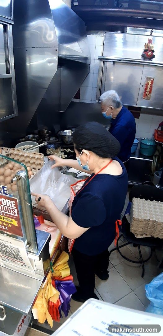Kitchen Staff Preparing Food