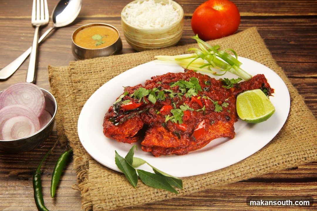 Spicy Fish Dish with Rice and Sides