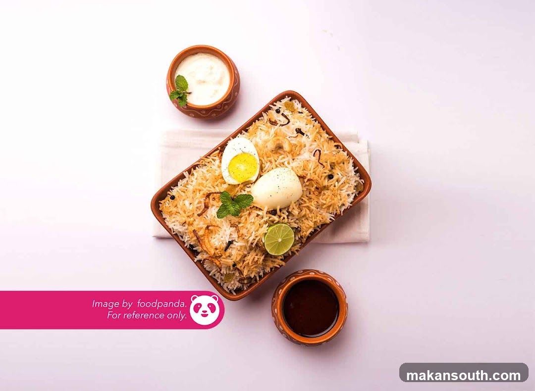 Egg Biryani with Raita and Sauce