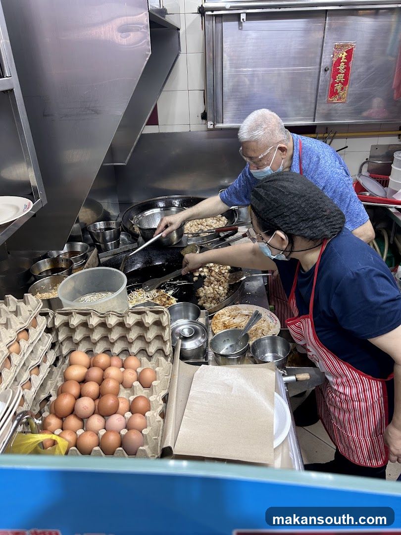 Chefs preparing food in a kitchen