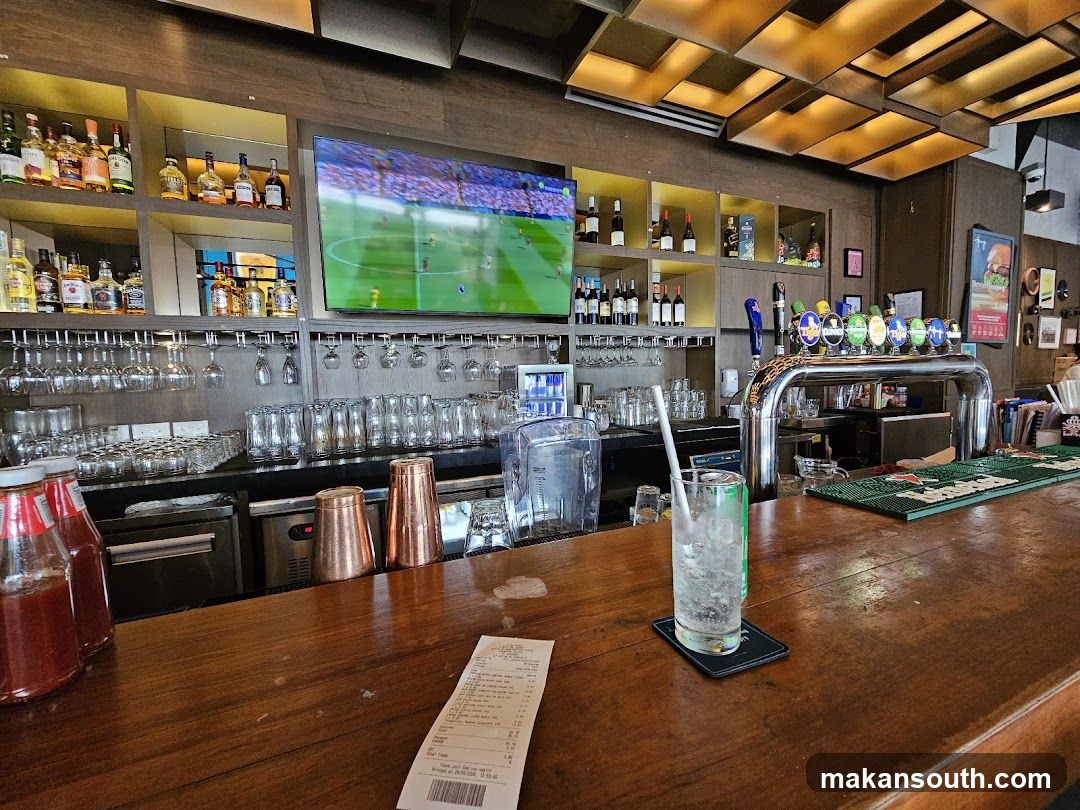 Bar Interior with Beer Taps and TV