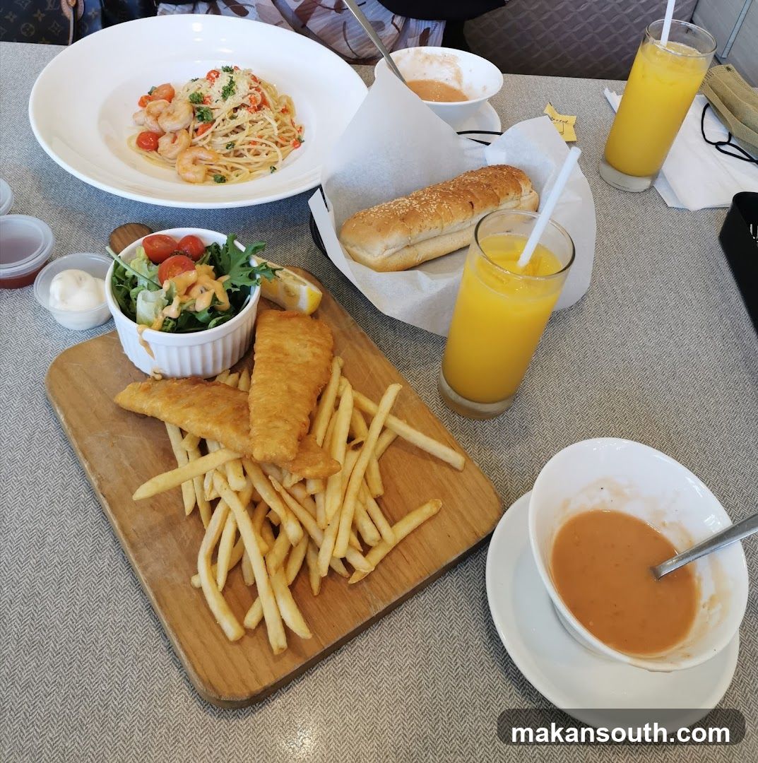 Fish and Chips with Pasta and Orange Juice