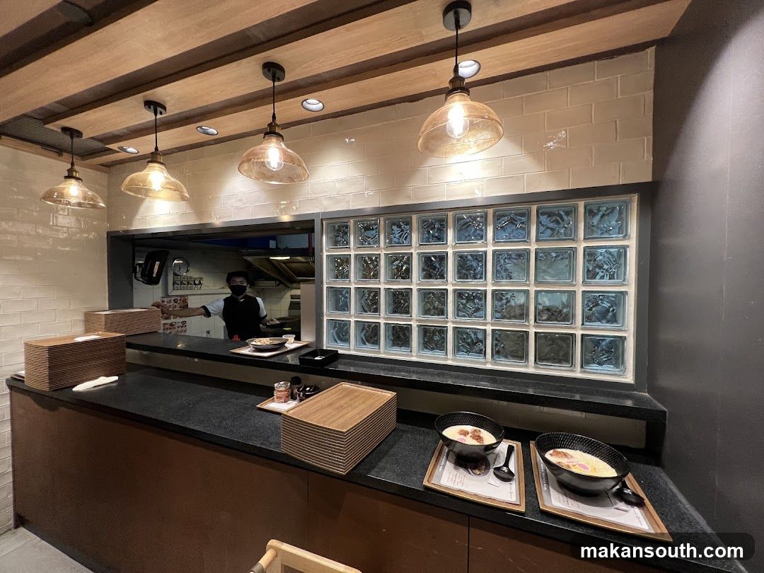 Restaurant Counter with Food and Staff