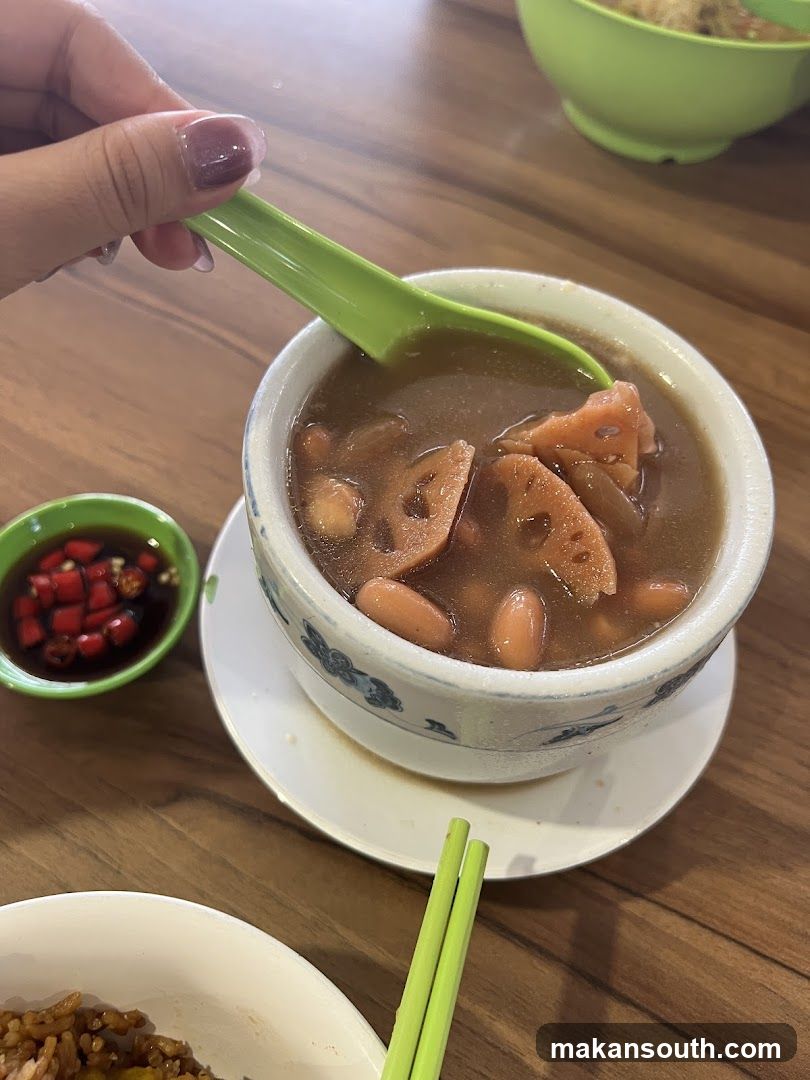 Bowl of soup with lotus root and peanuts