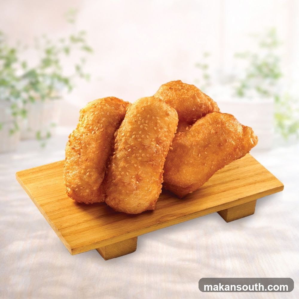 Fried Dough Pastries with Sesame Seeds
