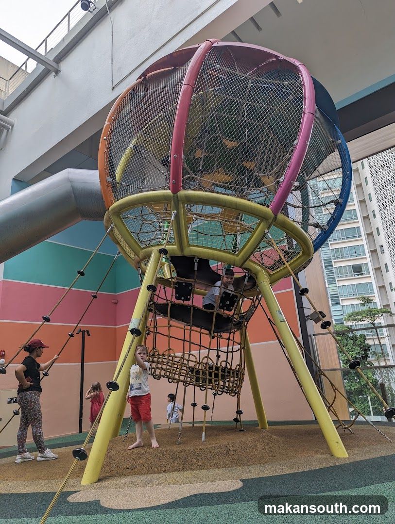 Children playing in a colorful indoor playground