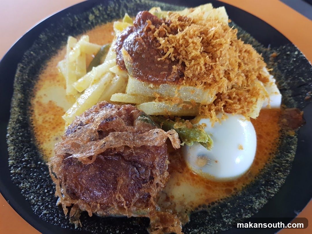 Lontong with Egg and Fried Patty