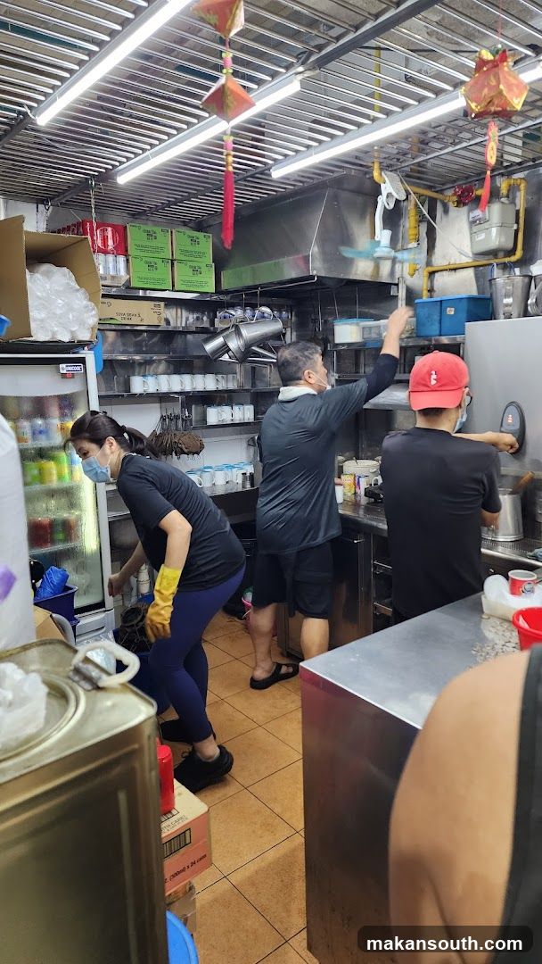 Kitchen Staff Preparing Food