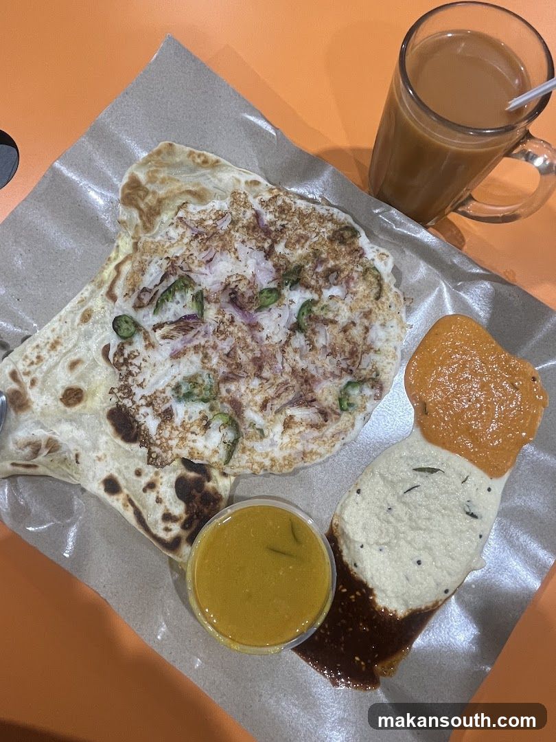Roti Canai with Curry and Teh Tarik