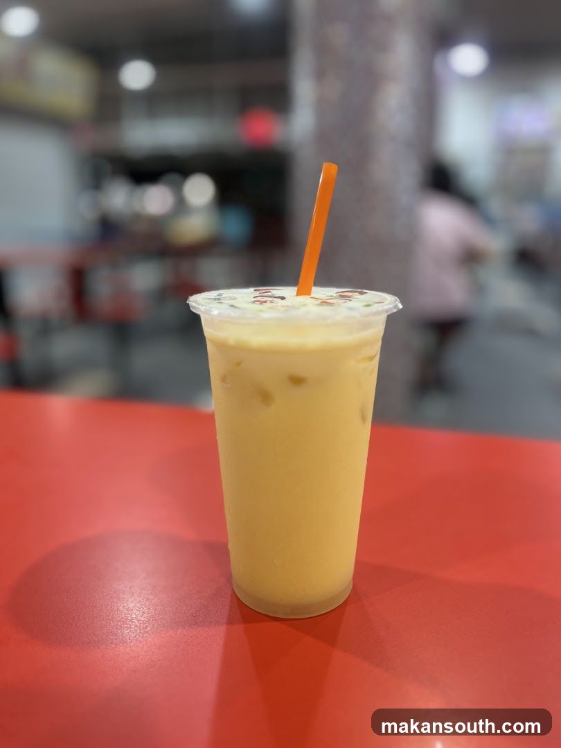 Yellow Drink with Orange Straw