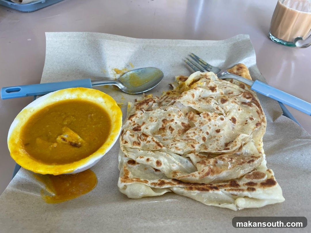 Roti Canai with Curry and Teh Tarik