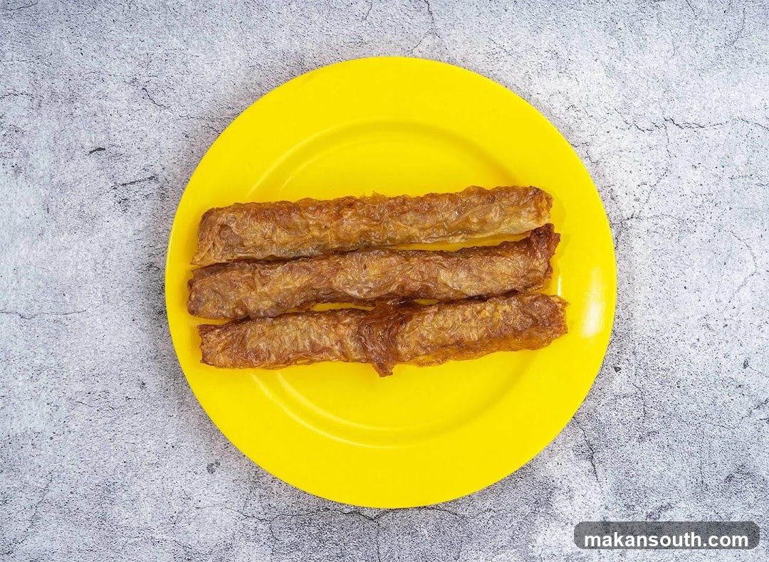 Fried Rolls on a Yellow Plate