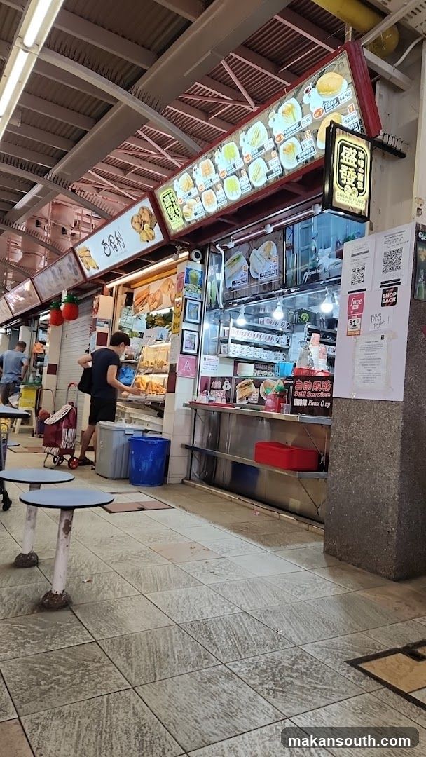 Food stall with menu and seating