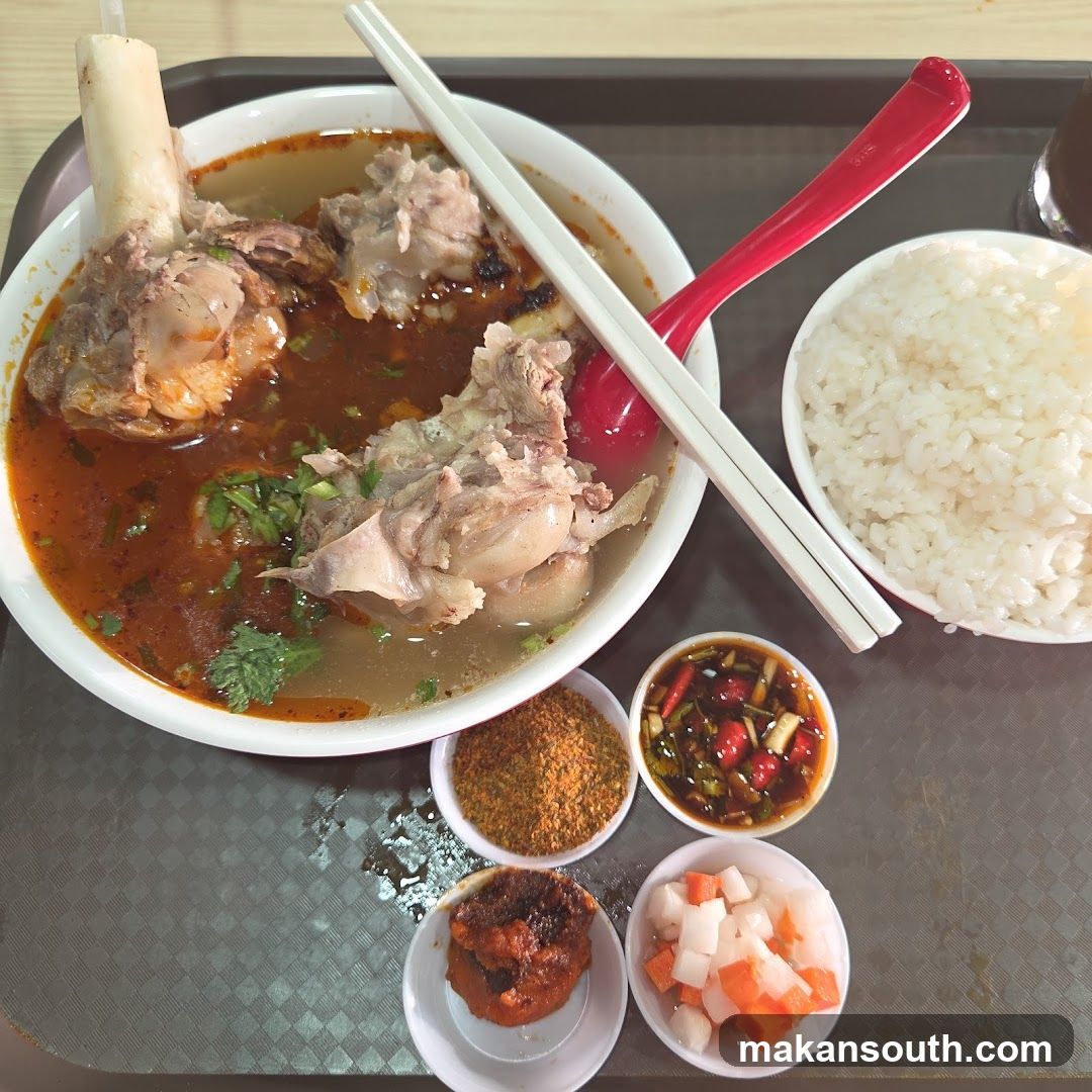 Bowl of Soup with Meat and Rice