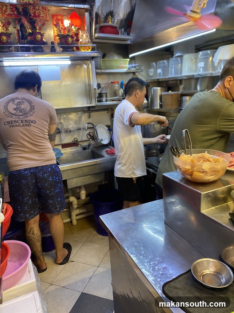 Kitchen Staff Preparing Food