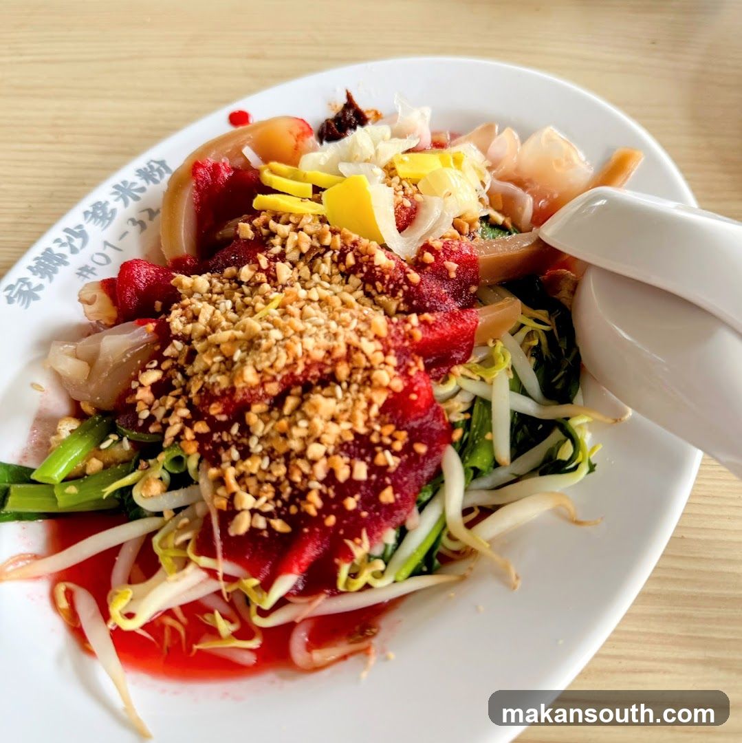 Noodle Dish with Red Sauce and Peanuts