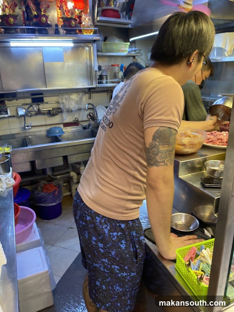 Kitchen Staff Preparing Food