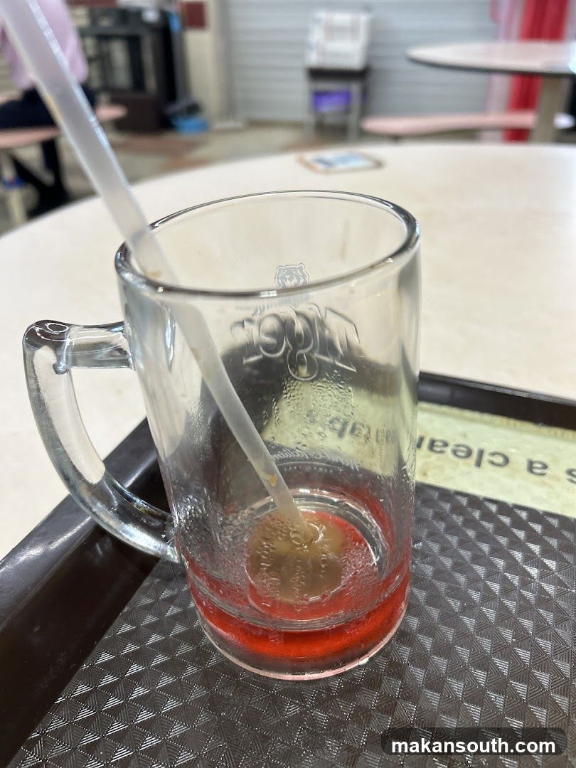 Empty Glass with Straw