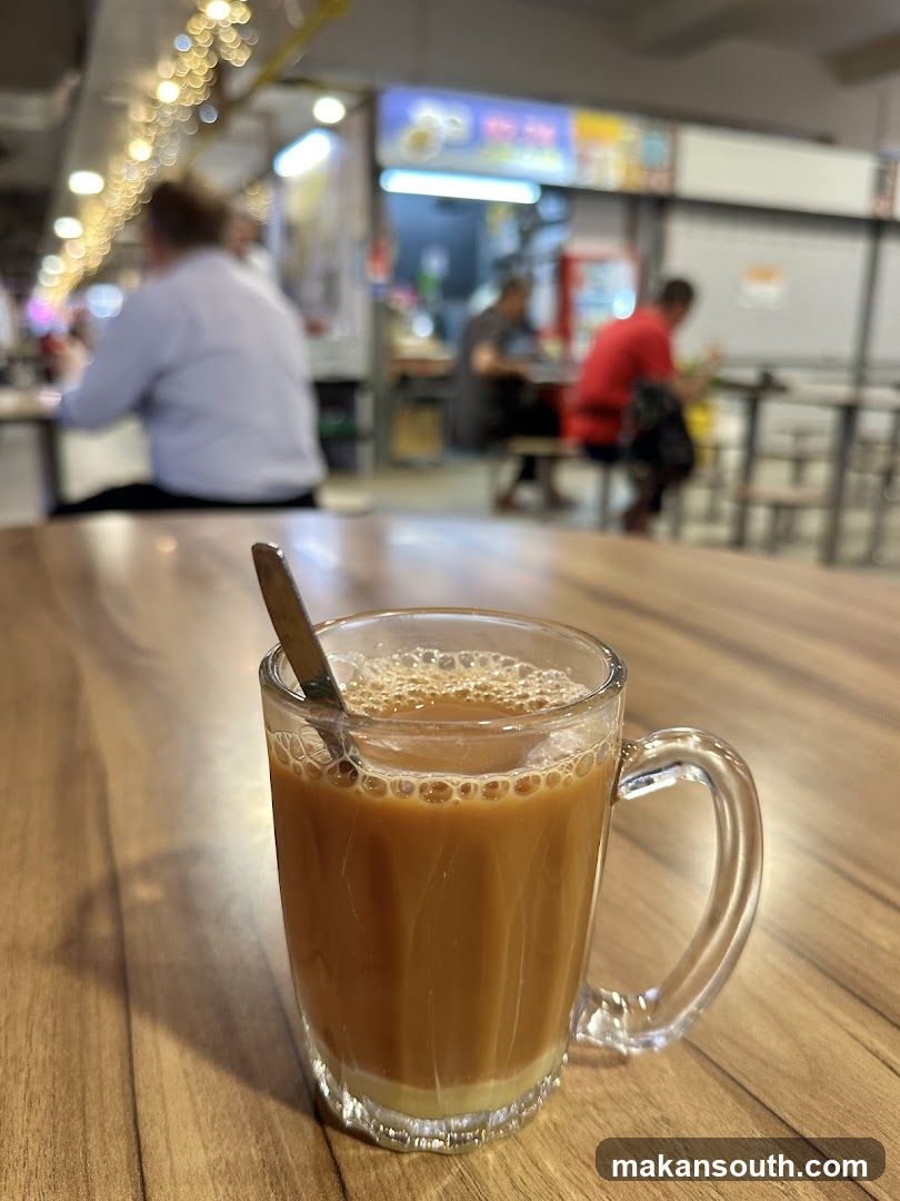 A cup of milk tea on a wooden table