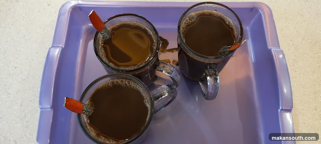 Three cups of coffee on a tray