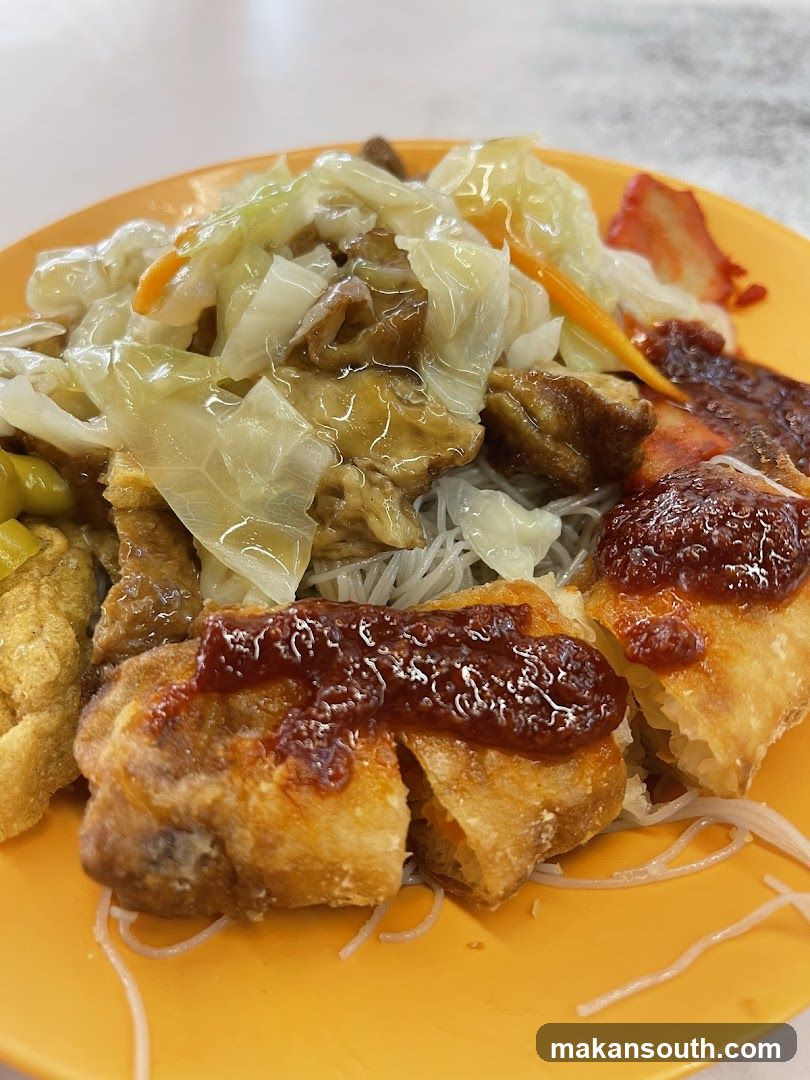 Plate of noodles with various toppings