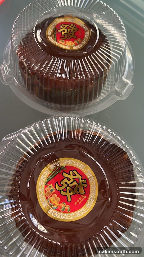 Two cakes in plastic containers