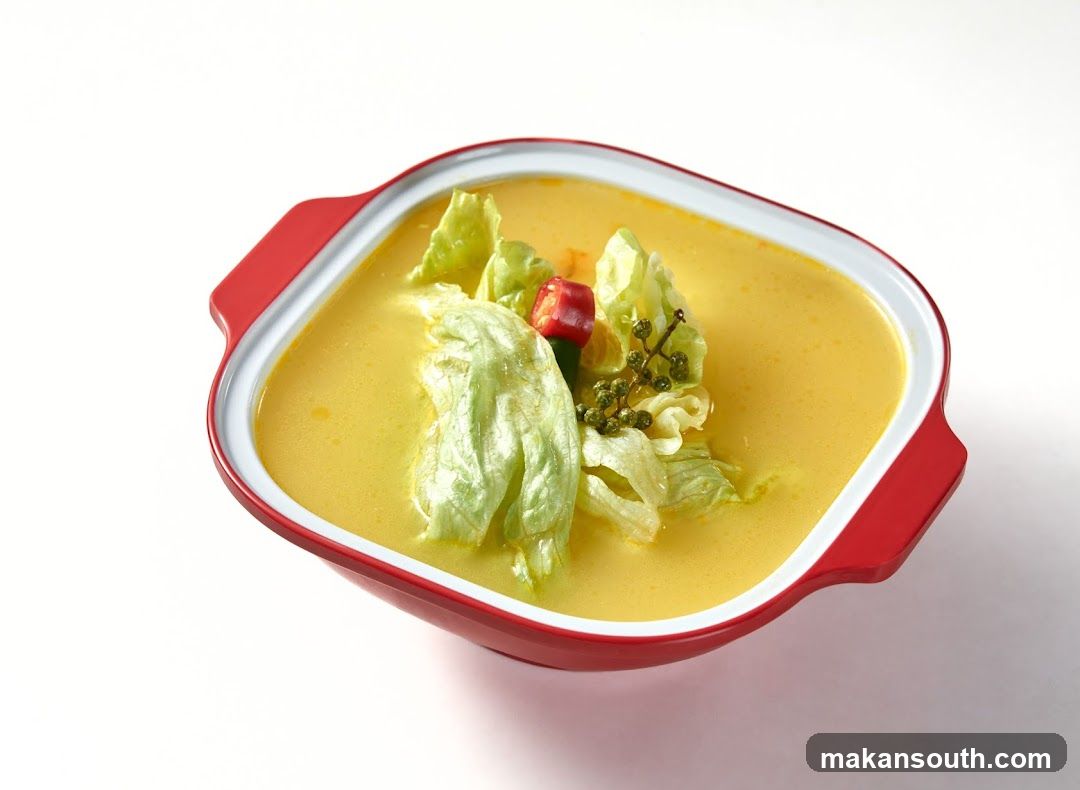 Yellow Curry Soup with Lettuce and Chili