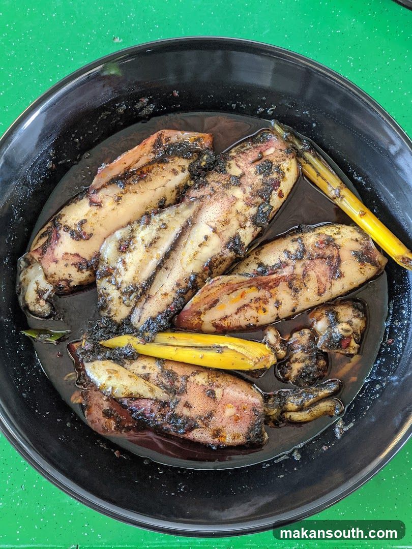 Squid in dark sauce