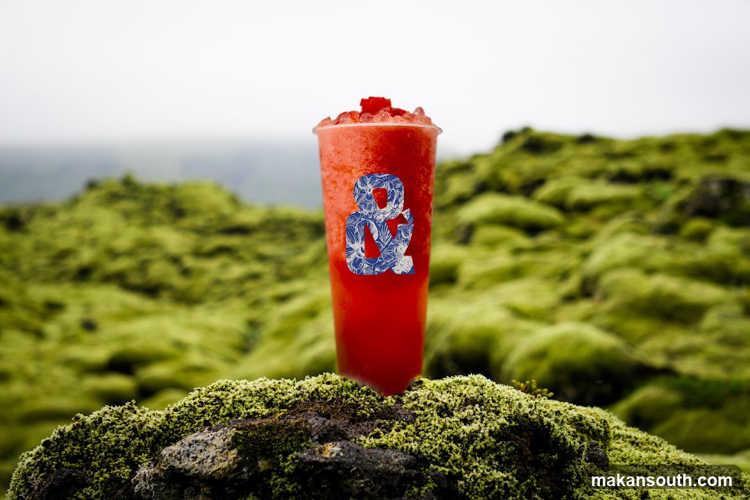 Red slushy with floral ampersand logo