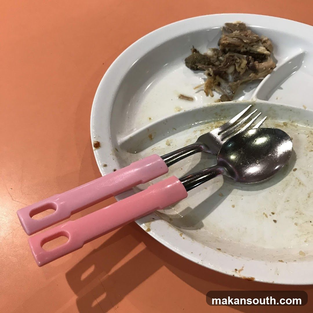 Dirty Plate with Utensils