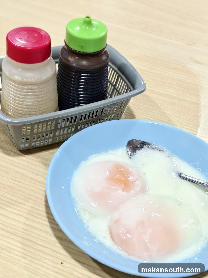 Soft-boiled eggs with condiments