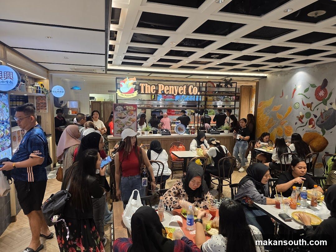 Busy restaurant interior with diners