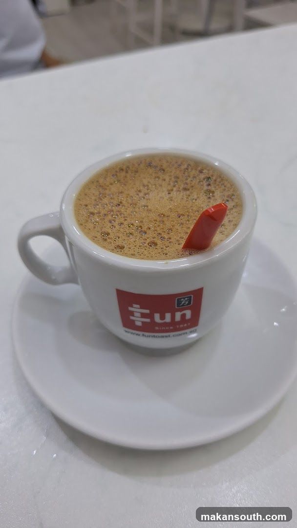Coffee with a Red Stirrer