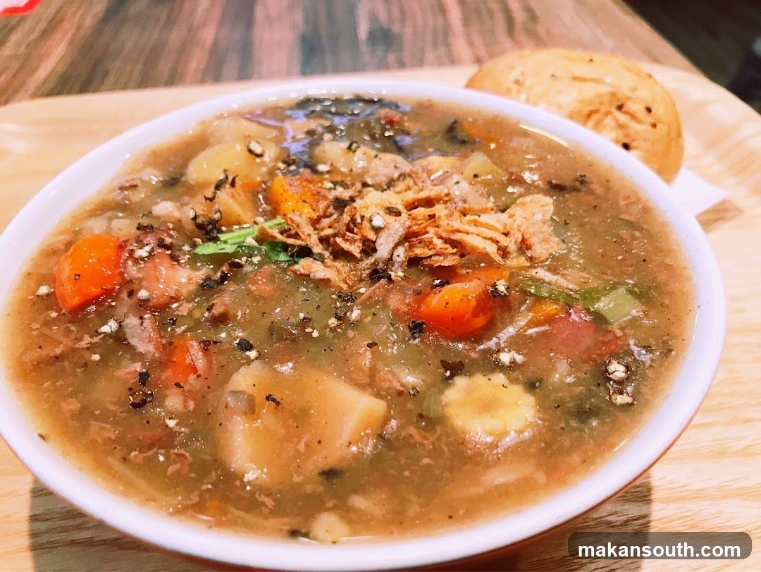 Hearty Stew with Bread Roll