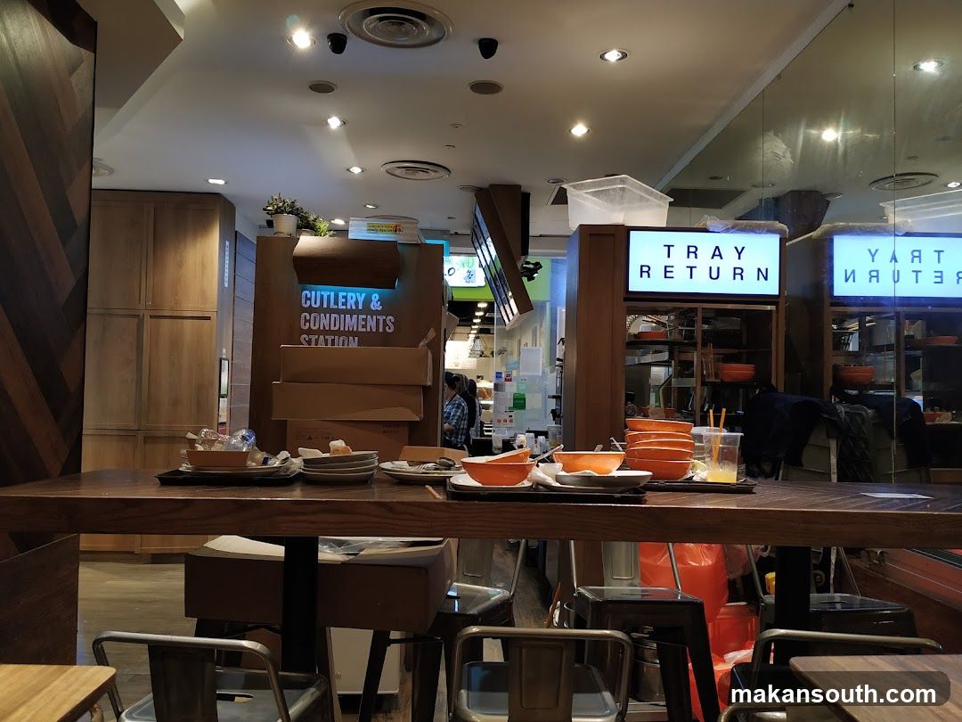 Restaurant Interior with Tray Return and Cutlery Station
