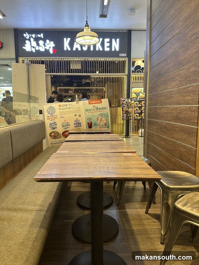 Restaurant Interior with Tables and Signage