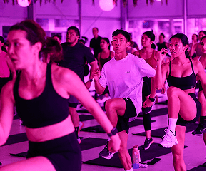 Global wellness leaders leading workouts at Glow Festival 2026 Sentosa