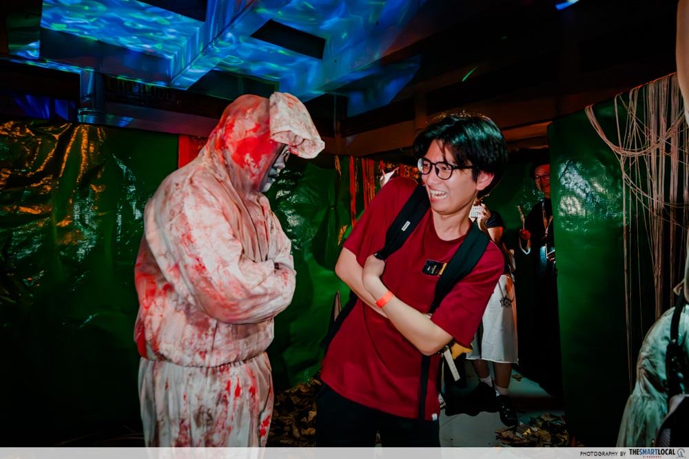 A pocong scare actor on the Haw Ror Villa 5 maze route at Haw Par Villa